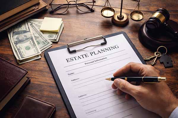 PULSE 4/10/2026: Estate Planning Without the “Silver Spoon”: Build a Legacy That Lasts 3 document being singned on a desk with money in the background